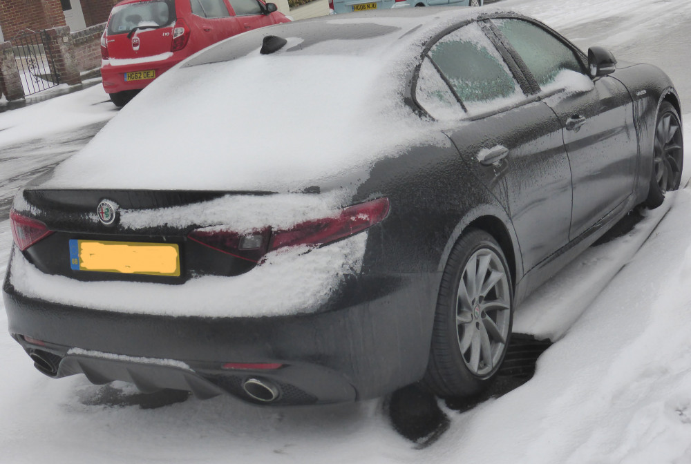 A rear wheel drive Alfa Romeo in winter